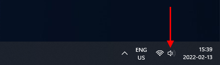 Windows 11 tray bar with indicated speaker icon.