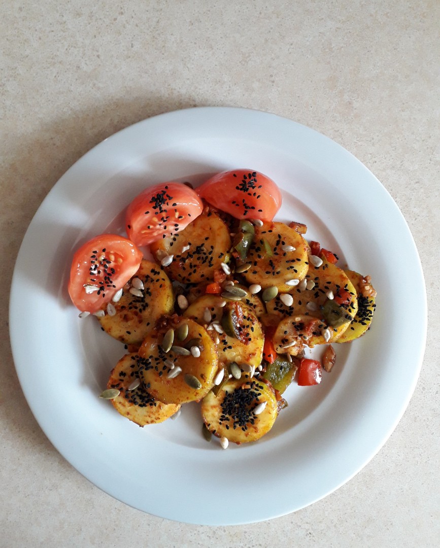 Grilled zucchini with peppers and tomatoes